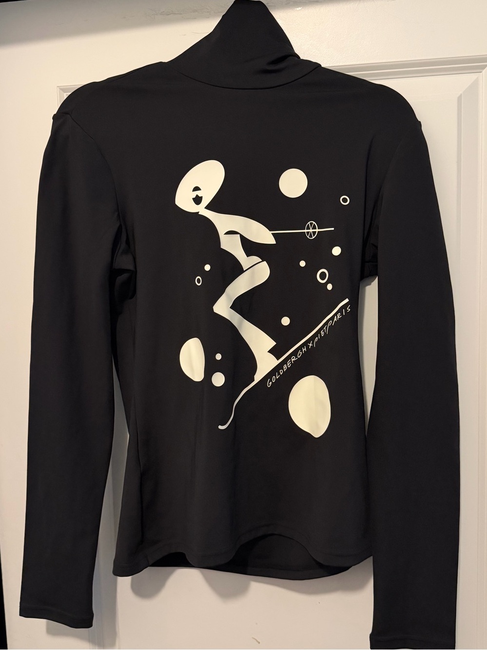 Goldbergh Black Long-Sleeve Top with White Abstract Surf Graphic